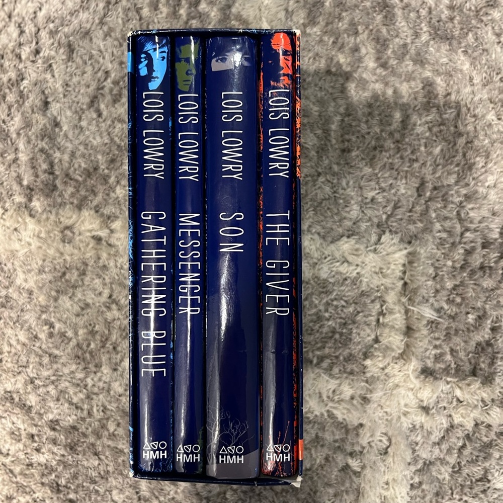 Lois Lowry The Giver book set. Four hardcover books see pics like new MSRP $40
